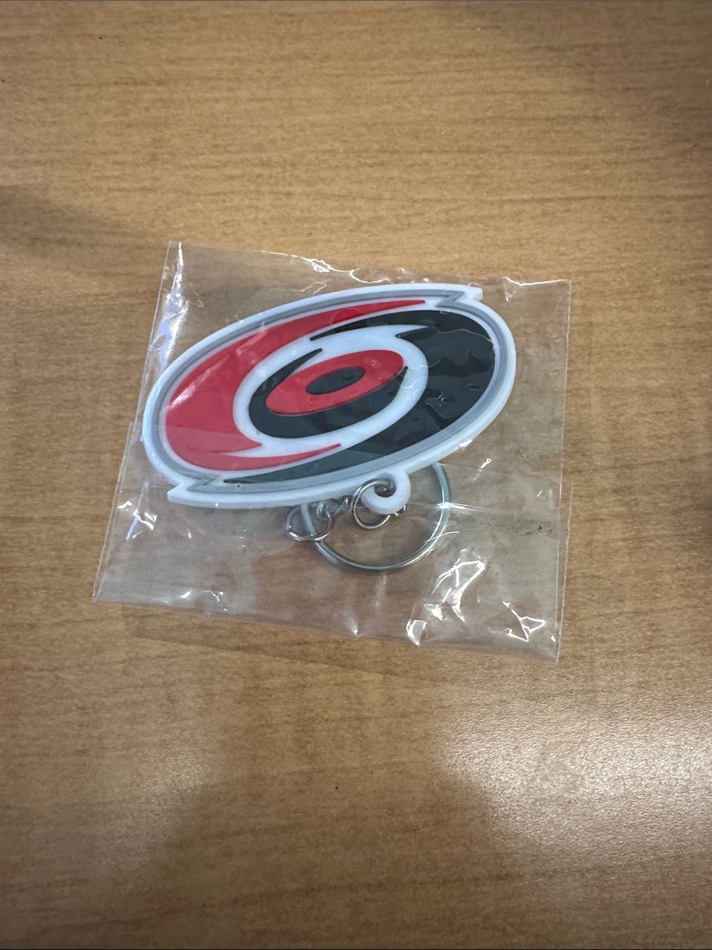 Red and Black Canes Hockey Keychain